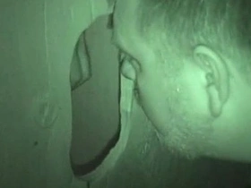 Public restroom glory hole action with cum and sucking