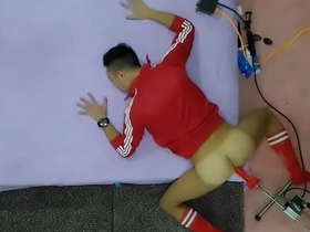 Red fun with buttmachine and dildo in gay Asian video.