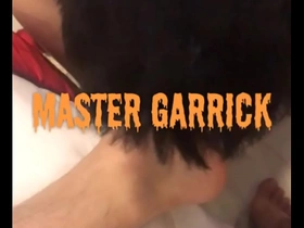Master Garrick humiliates his Asian slave with his feet.