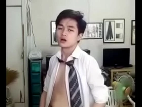 A handsome Asian boy strips and ejaculates in a solo performance.