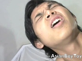 Gay Asian twinks having sex with a masked man.