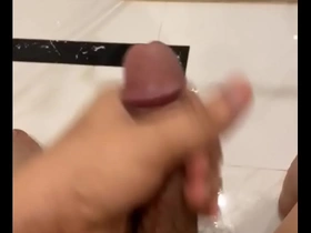 Solo boy with an Asian look gives a great handjob.