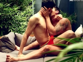 An Asian bottom gets spammed by a white hunk outdoors in gay porn.