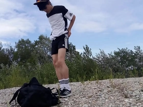 Jon Arteen, the cute Asian twink, in black Adidas attire, freeballing and outdoors.