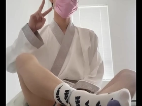 Asian sissy boy in a hanfu masturbates and gets a facial.
