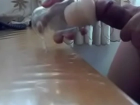 Beautiful Asian amateur masturbates with a bottle and toy