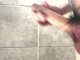 Young Japanese man masturbates with his big dick.