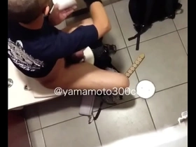 Gay toilet scene with a handjob