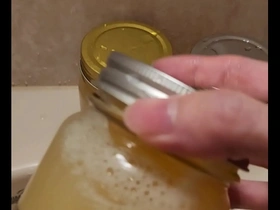 Frozen semen cumshot in a gay cumjar